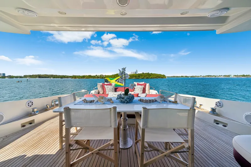 Slide: The Image of Luxury yacht Azimut 86S 2009, elegant deck dining area with ocean view. - 53