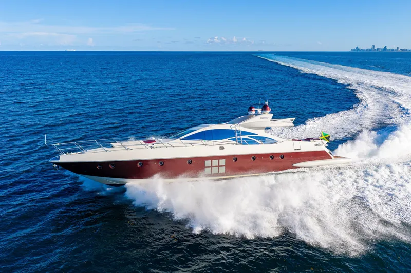 Slide: The Image of Luxury 2009 Azimut 86S yacht cruising swiftly on open blue ocean. - 41