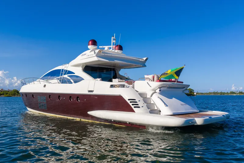 Slide: The Image of 2009 Azimut 86S yacht on water, clear sky, rear view. - 17