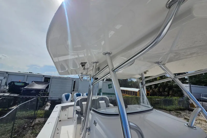 Slide: The Image of 2018 Regulator 34 Center Console boat with sleek design and sturdy framework. - 14