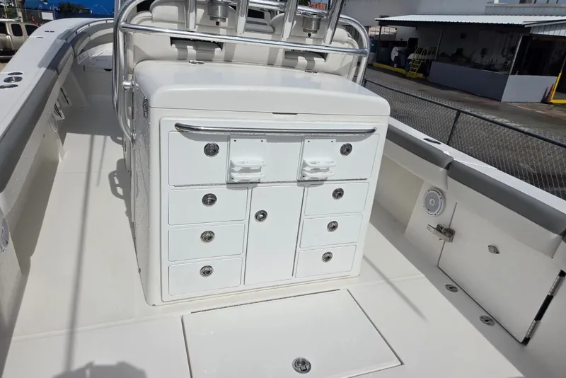 Slide: The Image of 2018 Regulator 34 Center Console boat interior with storage compartments. - 36