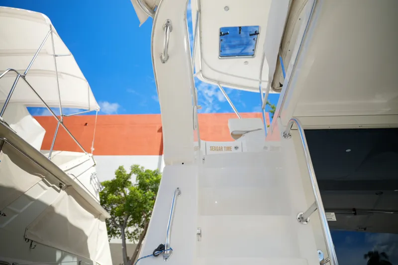 Slide: The Image of 2014 Silverton 36 Convertible yacht stairs with blue sky background. - 3