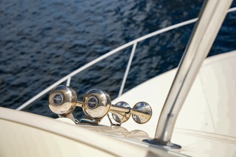 Slide: The Image of Close-up of 2014 Silverton 36 Convertible yacht horn against water backdrop. - 23