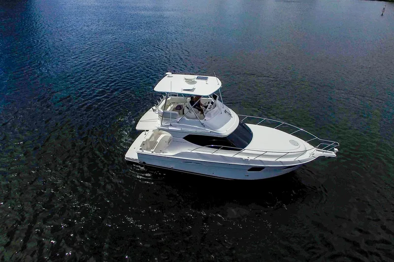 Slide: The Image of 2014 Silverton 36 Convertible yacht cruising on open water. - 35