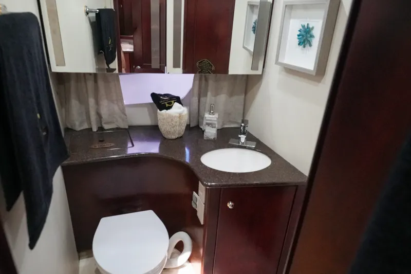 Slide: The Image of Luxurious bathroom interior of 2014 Silverton 36 Convertible yacht with modern fixtures. - 13