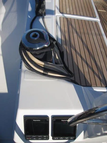 Slide: The Image of Jeanneau 380 2024 sailboat deck with winch and Raymarine displays. - 45