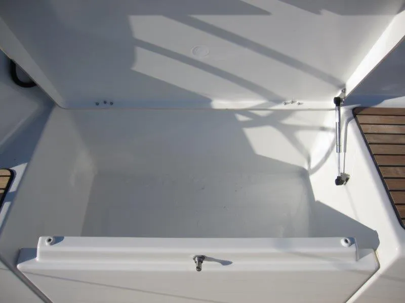 Slide: The Image of Open storage compartment on a 2024 Jeanneau 380 sailboat. - 47