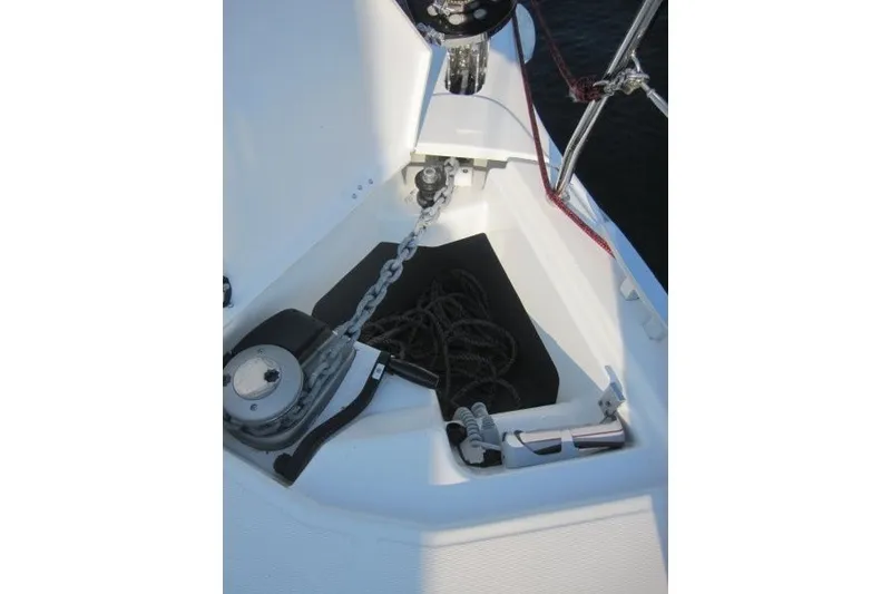 Slide: The Image of Anchor chain and rope storage on 2024 Jeanneau Sun Odyssey 380 sailboat deck. - 31