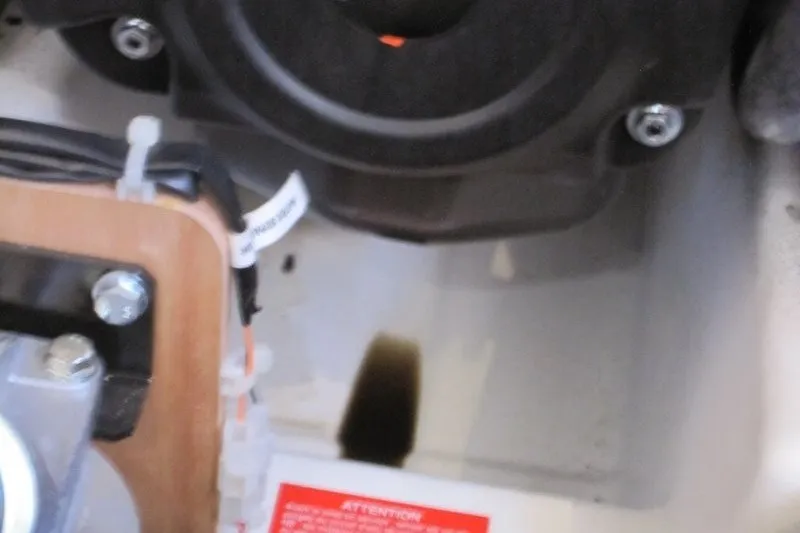 Slide: The Image of Engine compartment of 2024 Jeanneau Sun Odyssey 380 sailboat, showing mechanical components. - 21
