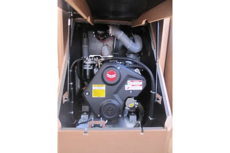 Slide: The Image of Engine compartment of 2024 Jeanneau Sun Odyssey 380 sailboat, showcasing mechanical components. - 20