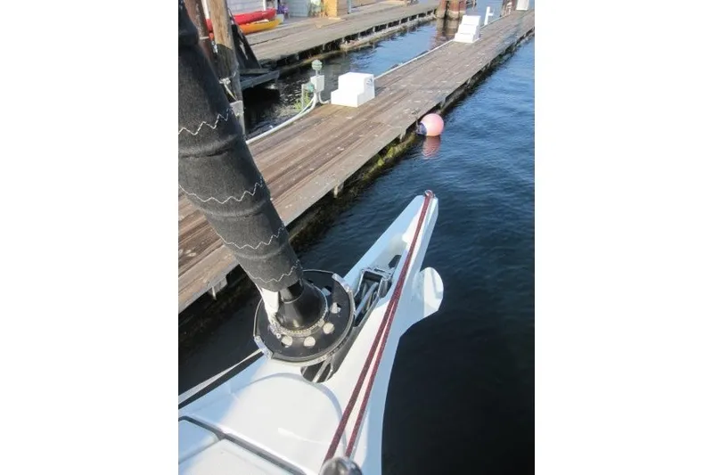 Slide: The Image of Bow of 2024 Jeanneau Sun Odyssey 380 yacht docked at marina. - 32