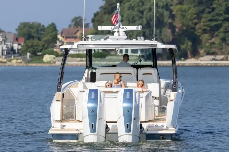 Slide: The Image of Manufacturer Provided Image: 2026 Tiara Yachts 39 LS cruising on a lake with passengers enjoying the view. - 3