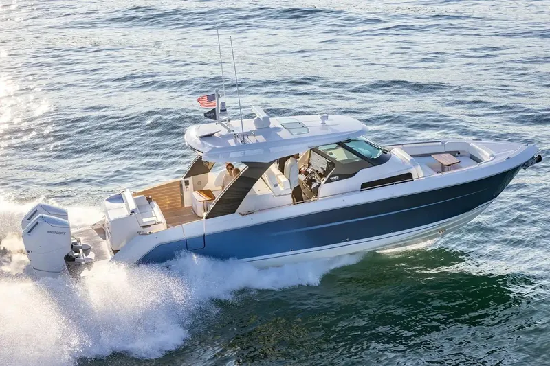 Slide: The Image of Manufacturer Provided Image: 2026 Tiara Yachts 39 LS cruising on open water, showcasing sleek design and powerful engines. - 2
