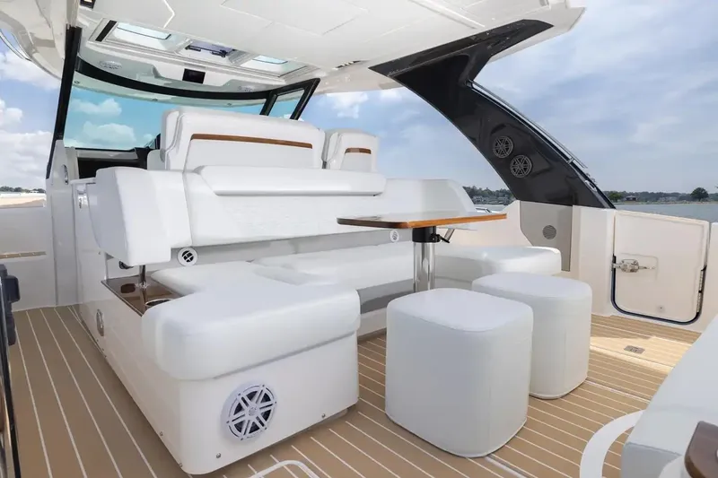 Slide: The Image of Manufacturer Provided Image: Luxurious interior of 2026 Tiara Yachts 39 LS with elegant seating and table. - 10