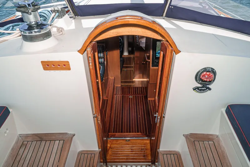 Slide: The Image of Philbrook's 69' Custom PH Sailing Sloop 1999 - cabin entrance with wooden flooring. - 29