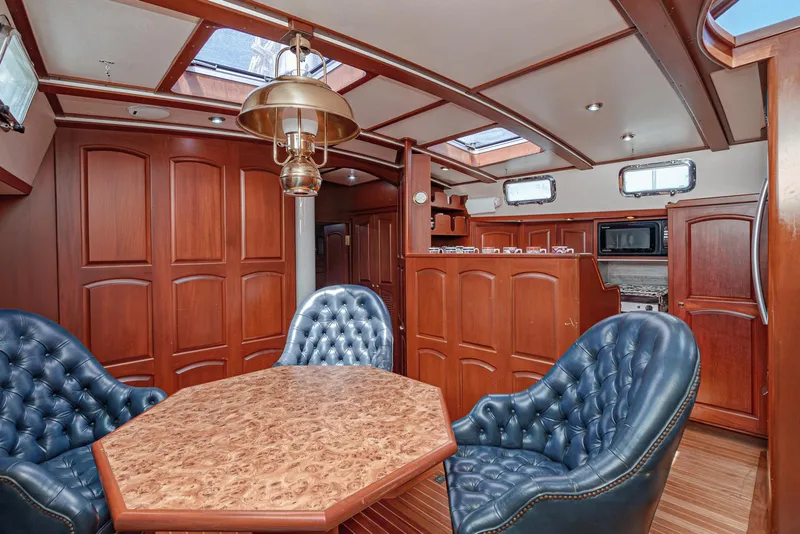 Slide: The Image of Luxurious interior of 1999 Philbrook's 69' Custom PH Sailing Sloop with elegant wood finish. - 37
