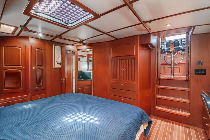 Slide: The Image of Luxurious wooden interior of 1999 Philbrook's 69' Custom PH Sailing Sloop cabin. - 48