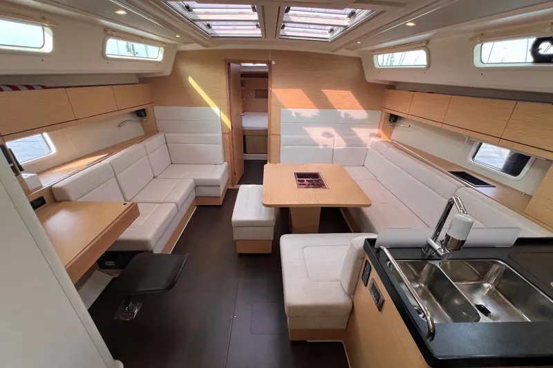 Slide: The Image of Luxurious interior of 2020 Hanse 458 yacht with modern seating and kitchen area. - 42