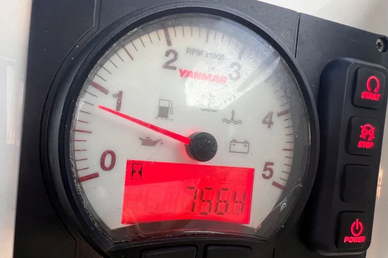 Slide: The Image of Yanmar tachometer on 2020 Hanse 458 sailboat, displaying RPM and engine hours. - 73