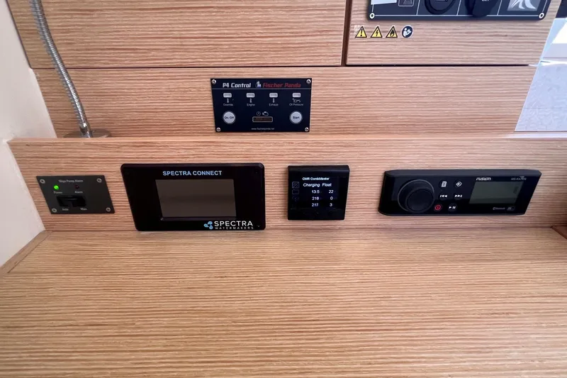 Slide: The Image of Control panel of a 2020 Hanse 458 yacht featuring Spectra Connect and Fusion systems. - 58