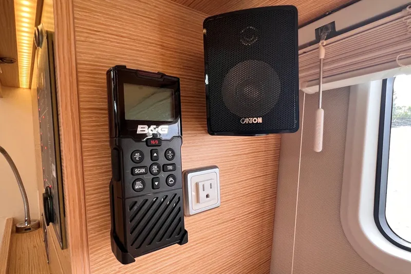 Slide: The Image of B&G marine radio and Canton speaker in 2020 Hanse 458 yacht interior. - 57
