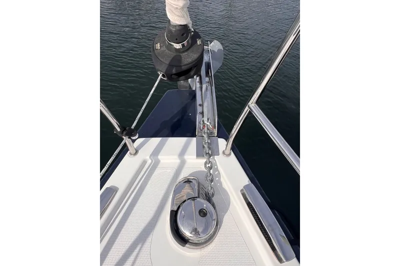 Slide: The Image of Bow of 2020 Hanse 458 yacht with anchor chain and winch system. - 10