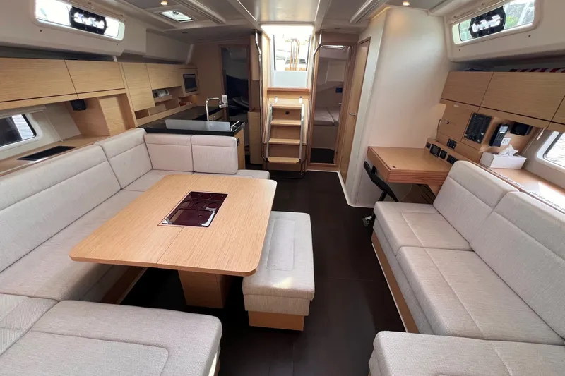 Slide: The Image of Luxurious interior of 2020 Hanse 458 yacht with modern seating and dining area. - 43