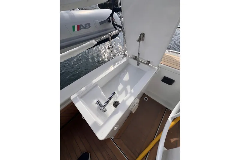 Slide: The Image of Outdoor sink on 2020 Hanse 458 yacht, featuring a sleek design and chrome faucet. - 32