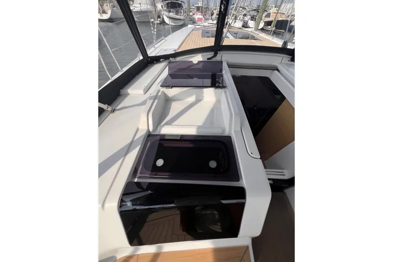 Slide: The Image of 2020 Hanse 458 yacht cockpit with sleek design and modern amenities. - 39