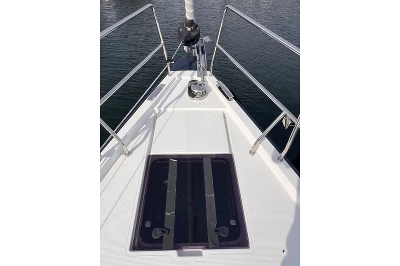 Slide: The Image of Bow of 2020 Hanse 458 yacht with sleek deck design and railing. - 11