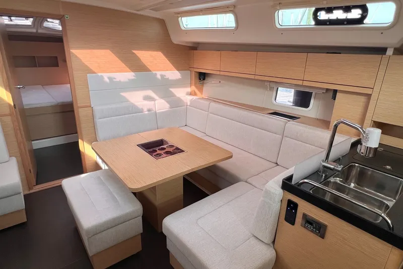 Slide: The Image of Modern interior of 2020 Hanse 458 yacht with cozy seating and kitchenette. - 45