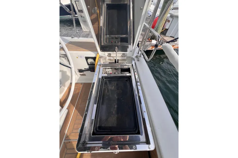 Slide: The Image of Outdoor kitchen on 2020 Hanse 458 yacht with grill and storage compartments. - 33