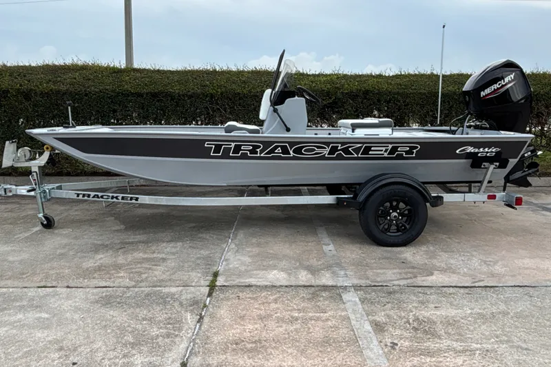 The Image of 2027 Tracker Bass Tracker Classic CC boat on trailer, side view. - 0