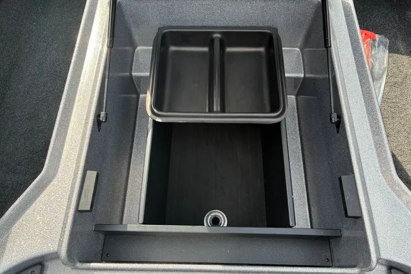 Slide: The Image of 2027 Nitro Z18 XL Pro storage compartment with black tray and drain plug. - 13