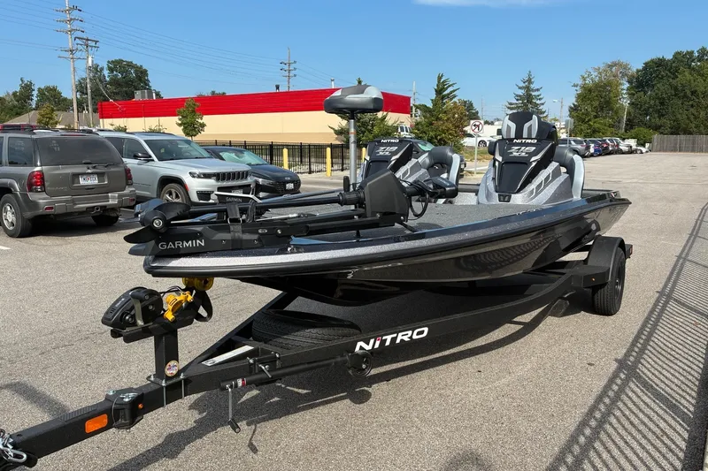 Slide: The Image of 2027 Nitro Z18 XL Pro boat on trailer in parking lot, featuring Garmin equipment. - 5