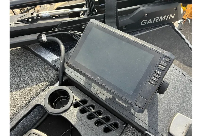 Slide: The Image of Garmin display on 2027 Nitro Z18 XL Pro boat dashboard with cup holder. - 9