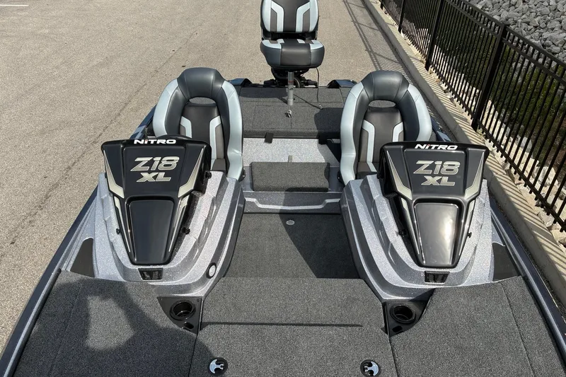 Slide: The Image of 2027 Nitro Z18 XL Pro boat interior with dual seats and sleek design. - 10