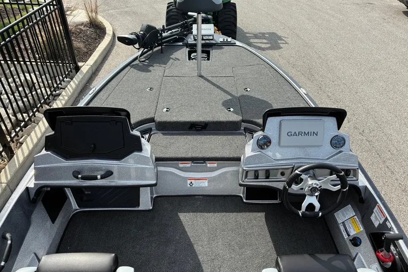 Slide: The Image of 2027 Nitro Z18 XL Pro boat dashboard with Garmin navigation system and steering wheel. - 7