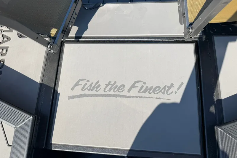 Slide: The Image of "Fish the Finest!" text on 2027 Tracker Grizzly 1756 T Marsh boat floor. - 14