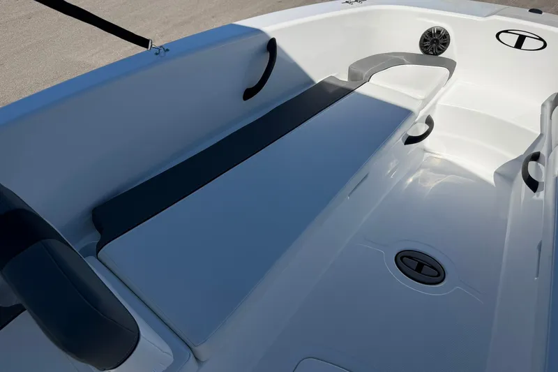 Slide: The Image of 2027 Tahoe T18 boat interior with sleek seating and modern design features. - 18