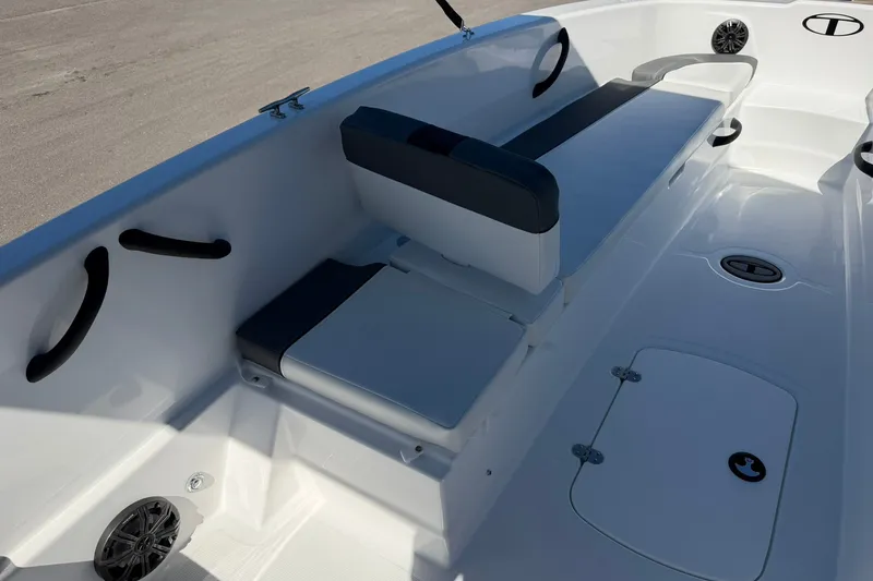 Slide: The Image of Interior of 2027 Tahoe T18 boat featuring sleek seating and modern design elements. - 16