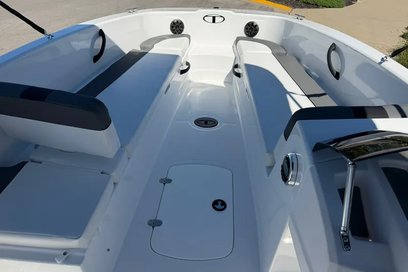 Slide: The Image of 2027 Tahoe T18 boat interior with sleek seating and modern design. - 15