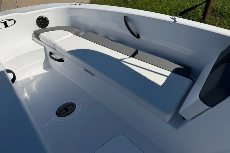 Slide: The Image of Interior of 2027 Tahoe T18 boat featuring sleek seating and modern design elements. - 17