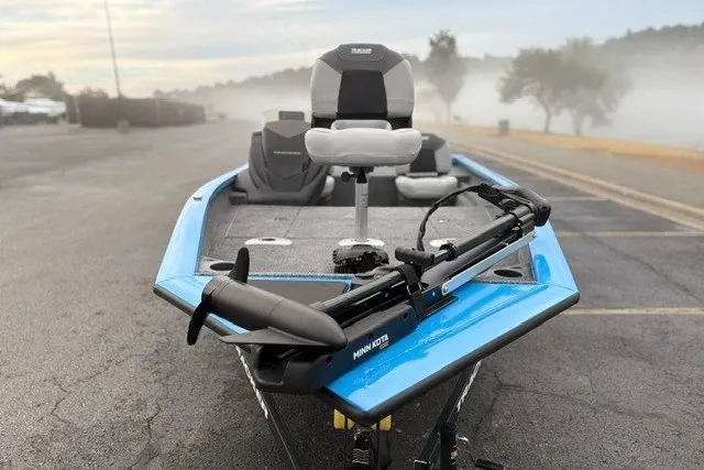 Slide: The Image of 2027 Tracker Pro Team 175 Crappie Edition boat in a misty lakeside setting. - 18