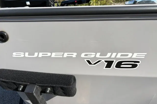 Slide: The Image of 2027 Tracker Super Guide V-16 T boat logo on a sleek gray surface. - 24