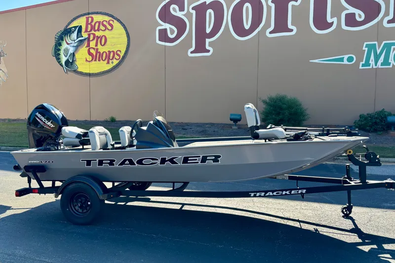 The Image of 2027 Tracker Pro 170 boat on trailer outside Bass Pro Shops. - 0