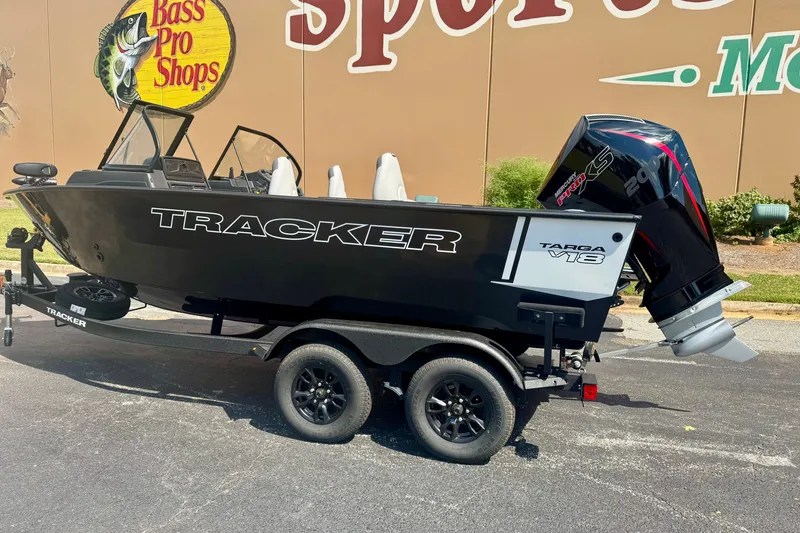 The Image of 2027 Tracker Targa V-18 Combo boat on trailer outside Bass Pro Shops. - 0