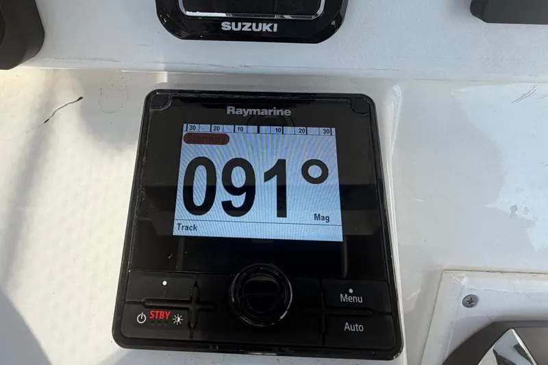 Slide: The Image of Raymarine navigation display showing 091 degrees on a 2001 Century 2900 Center Console boat. - 38