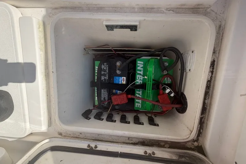 Slide: The Image of Battery compartment of a 2001 Century 2900 Center Console boat with Interstate battery. - 49
