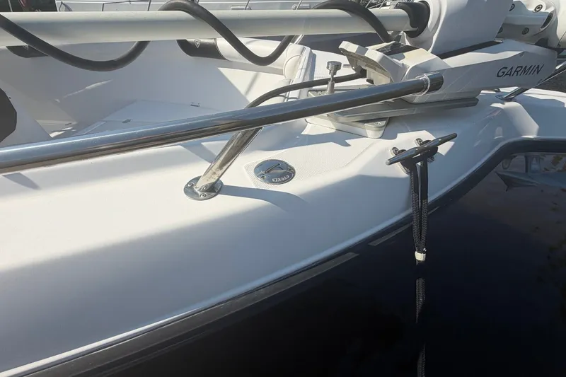 Slide: The Image of 2001 Century 2900 Center Console boat with Garmin equipment, docked and secured. - 53